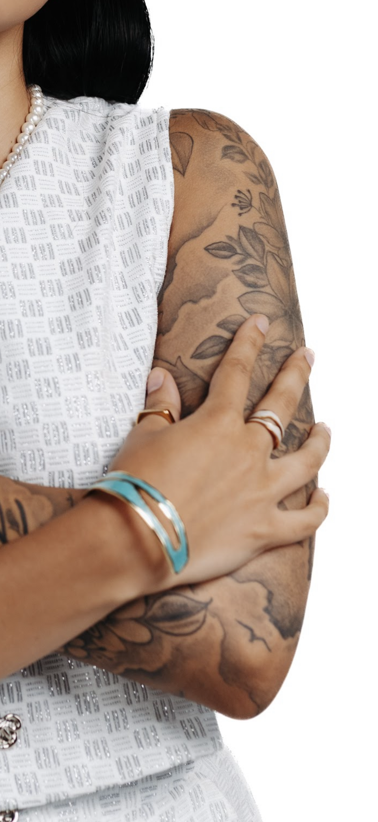 CameroonJewels Ciel d'Afrique adjustable gold-plated steel bangle with deep blue enamel worn on a tattooed arm