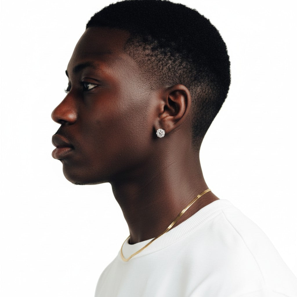 CameroonJewels La Discrète fine gold chain necklace worn by a man in profile, showcasing a minimalist elegant style.