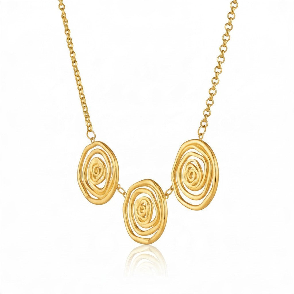 CameroonJewels Tourbillon necklace featuring three kinetic swirl pendants in 18K gold-plated waterproof steel